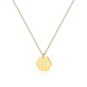 Detailed close-up of gold hexagonal pendant featuring cutout 222 angel numbers on chain