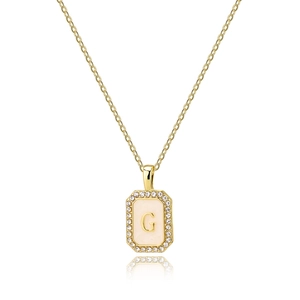 Gold square G letter necklace with shell inlay and pavé zircon crystals on white background