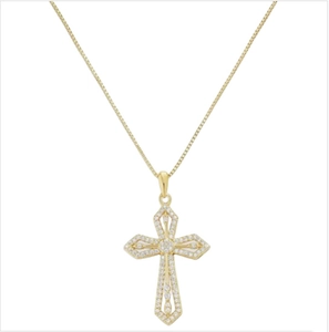Macro detail of gold cross pendant with pavé-set zircons on a delicate box chain