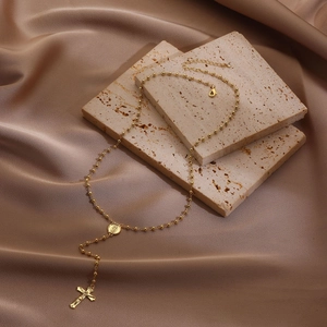 18K gold plated beaded chain necklace featuring a vintage virgin mary medal and crucifix