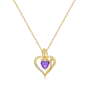 Detail of 18K gold heart necklace with a purple gem and a finely carved rose pendant