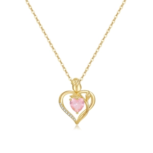 Detail of 18K gold necklace featuring a pink heart gem and intricate rose floral design