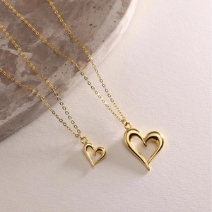Elegant gold heart pendant necklaces on O-chain, set of two minimalist jewelry pieces