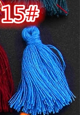 Detail of royal blue silk tassel with top hanging loop for DIY jewelry and bookmarks