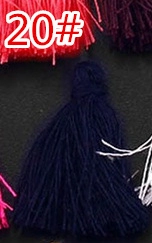 Detail of navy blue cotton silk tassels for DIY jewelry and bookmark crafts