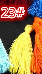 Macro detail of handmade colorful cotton tassels for DIY craft and garment accessories