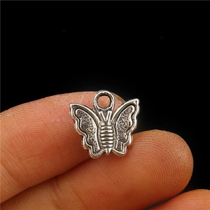Colgante de mariposa en aleación de plata vintage con relieve para joyería DIY