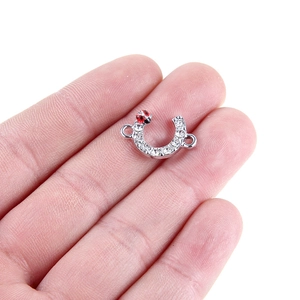 Silver horseshoe connector pendant with rhinestones and red enamel ladybug detail