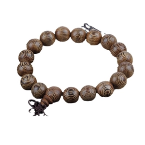 Handcrafted natural wenge wood prayer beads bracelet with brown handmade tassel