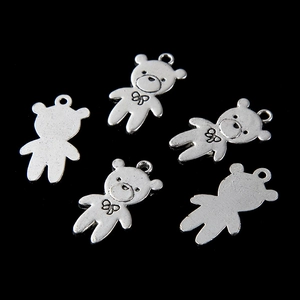 Five pieces of vintage silver alloy bear pendants with bow ties and hanging rings