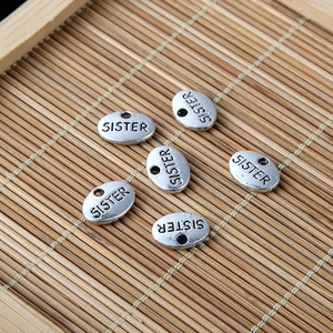 Set di 6 ciondoli ovali in argento con incisione SISTER per creazione di gioielli fai-da-te