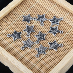 Star-shaped American flag charms in vintage silver finish for DIY jewelry crafts
