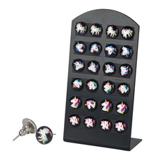 Detail view of 12 pairs of colorful unicorn stud earrings on a black display stand