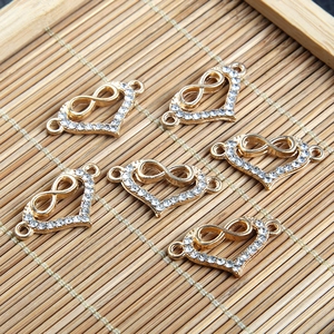 Connecteurs cœur dorés avec symbole infini et strass blancs pour bijoux personnalisés