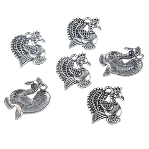 Antique silver peacock wings alloy pendants showing front and back details for DIY jewelry