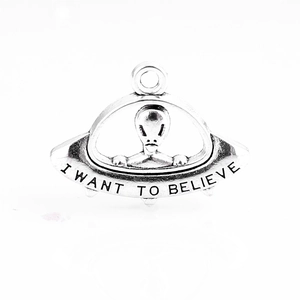 Antique silver UFO alien pendant necklace with I Want To Believe engraving detail