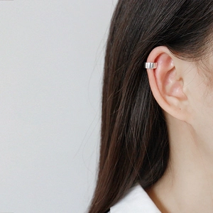 Minimalist silver C-shaped ear cuff for women with a sleek non-piercing metal finish