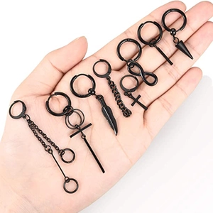 Men's black punk hoop earrings set featuring cross, feather, and cone dangles in palm