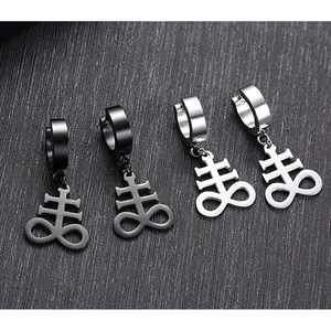 Gothic Leviathan Cross hoop earrings in black and silver finish on textured background