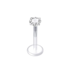 Detail of clear acrylic labret stud featuring a square zircon in a four-prong silver setting