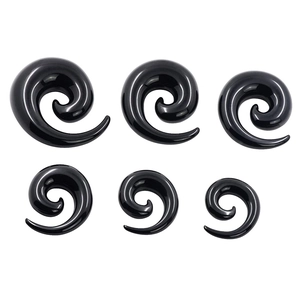 Set of six black acrylic spiral ear tapers in various sizes on a white background
