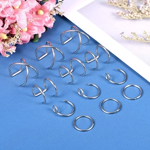 12-piece silver ear cuff set featuring cross, double-row, and ring designs on blue background
