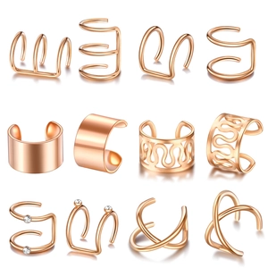 Set di 12 ear cuff in oro rosa con vari design, strass e finiture metalliche lucide