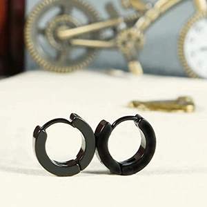 Minimalist black stainless steel huggie earrings for men shown from a 45-degree angle view