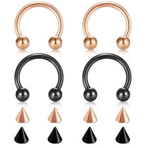 Detail view of horseshoe nose rings in rose gold and black finish with cone ends