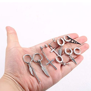Nine pairs of silver steel earrings set featuring cross, feather, and chain dangles