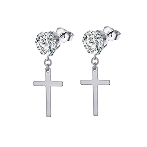 Detail showing silver cross earrings with six-claw set zircon and hanging cross pendant