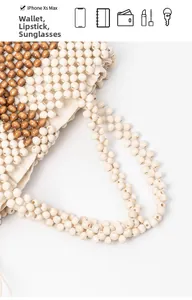 Detail of woven wooden bead tote bag showing beige lining and interior storage capacity
