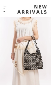 Detail of hand-woven beaded tote bag with geometric diamond pattern and dual handles