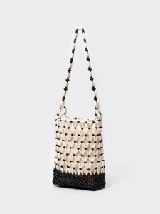Borsa a tracolla in perline fatta a mano con trama a contrasto nero e crema e coulisse