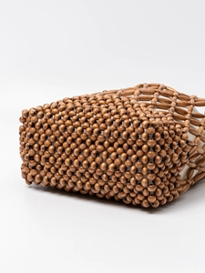 Handgefertigte gewebte Beuteltasche aus Holzperlen mit Canvas-Futter für den Strandurlaub