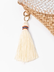 Handmade woven jute envelope clutch bag with silver metallic finish and beaded tassel charm