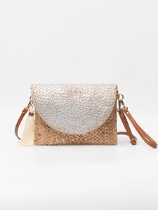 Handwoven jute envelope bag with silver foil accents and detachable shoulder strap