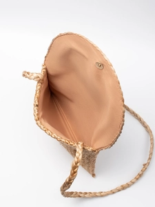 Ethnic jute woven crossbody bag with metal magnetic closure and smooth brown lining