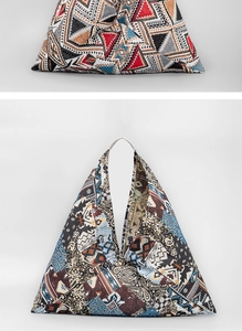 Macro view of geometric bohemian triangle tote bag with tribal jacquard texture details