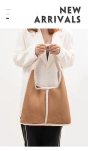 Detail of camel suede tote bag featuring plush white faux fur lining and contrast stitching