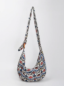 Bohemian geometric print canvas hobo bag with wooden ring detail for daily commute
