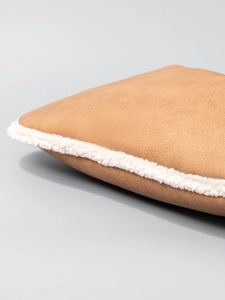 Vintage camel leather shoulder bag with white plush fleece trim and retro textures