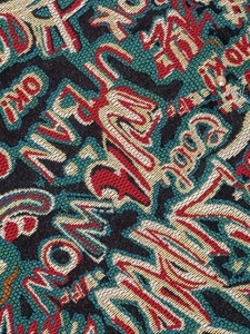 Bohemian dumpling handbag featuring woven street graffiti patterns and gold hardware