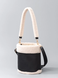 Vintage PU leather bucket bag with white plush trim and adjustable dual shoulder straps
