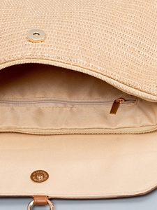Straw beach bag with magnetic clasp and internal zipper pocket detail view