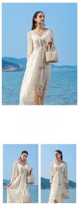 Detail view of handmade wooden bead bucket bag with intricate woven texture for beach styling