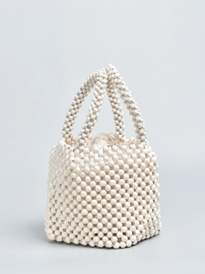 Handmade cream beaded bucket bag with woven wooden beads and drawstring linen pouch
