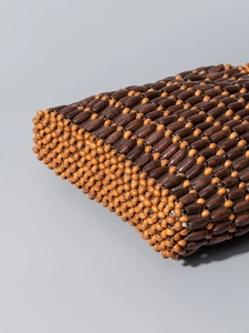 Handmade woven handbag with dark brown and beige wood beads in a stylish pattern