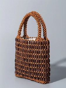 Handmade wooden bead tote bag in brown and orange contrast with durable inner lining