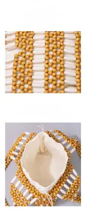 Macro detail of hand-woven hollow wooden bead bag showing yellow and white texture